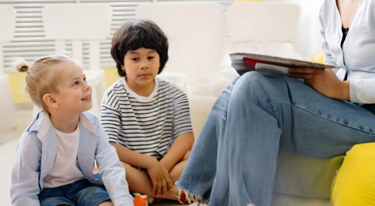 The children in the Japanese class are listening to their teacher.